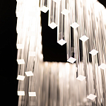 Люстра золотого цвета в форме галочки с каскадом длинных прозрачных трубок Eurofase варинант исполнения - 11 | Loft Concept в Екатеринбурге